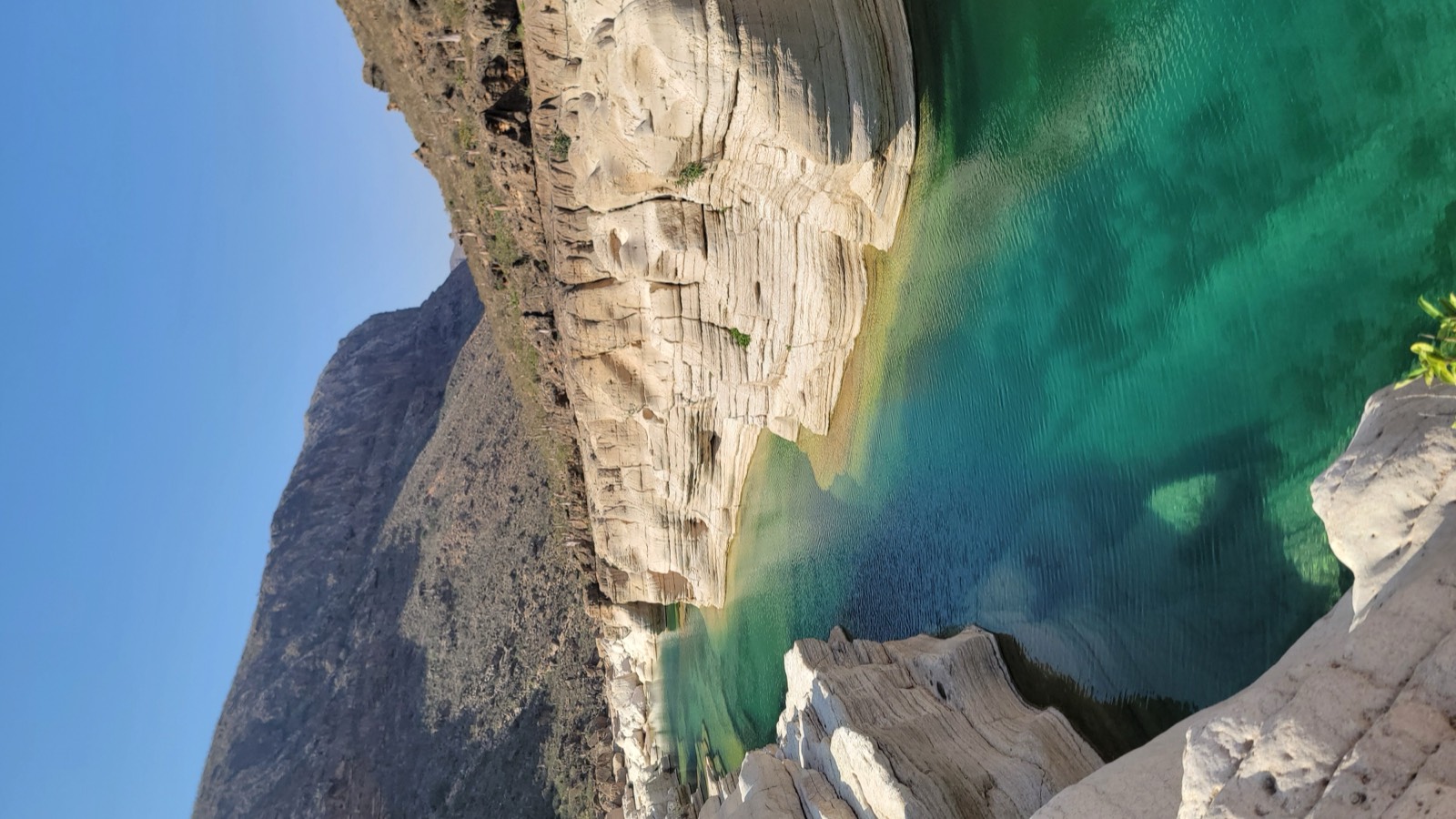 Canyon pool among white rocks