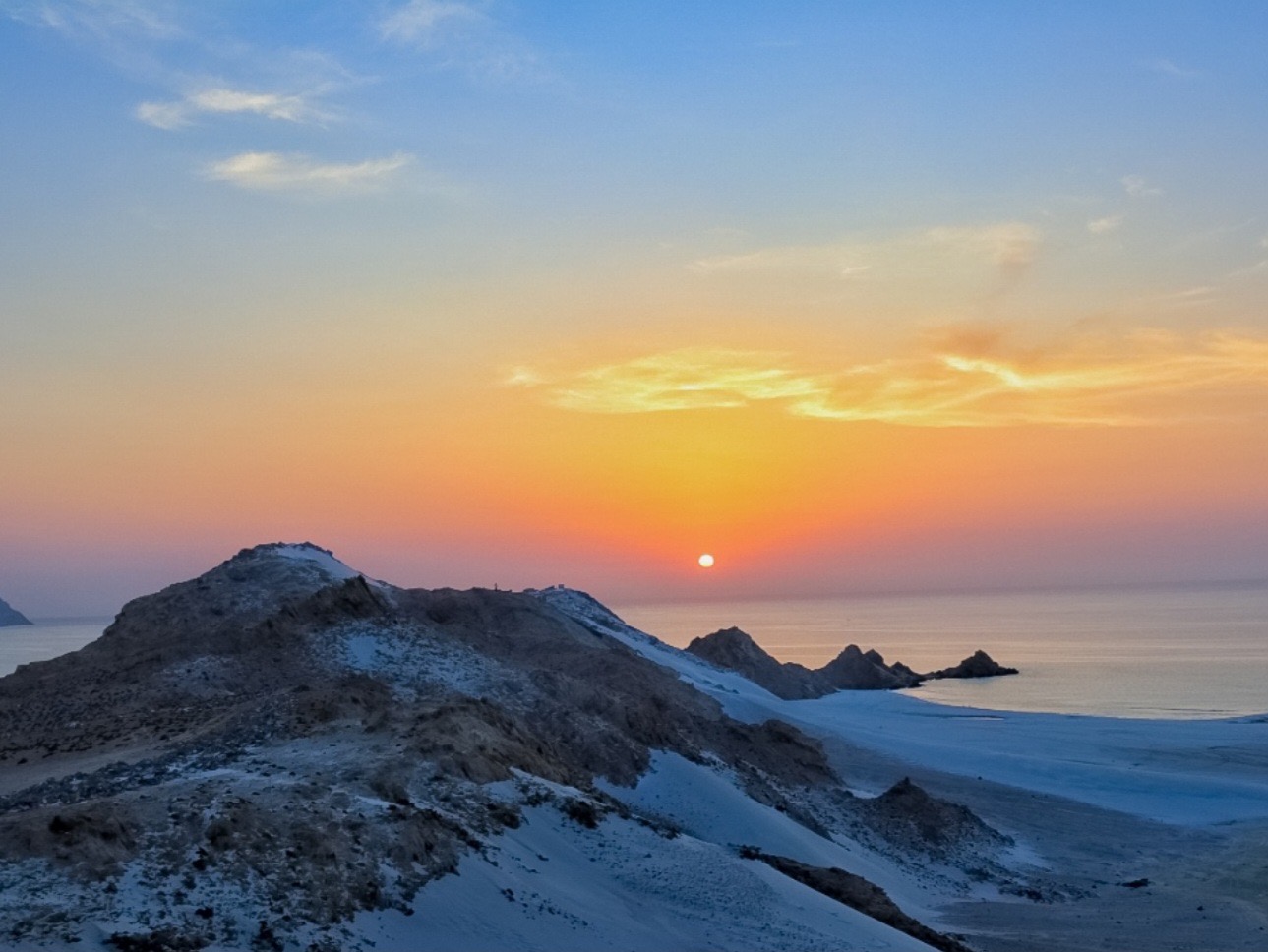 Sunset over the dunes at Detwah